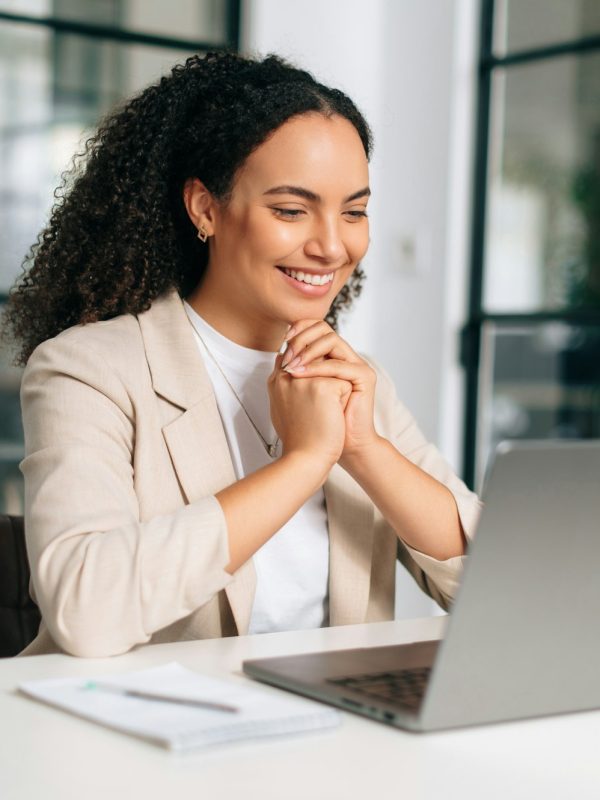 Positive brazilian or hispanic curly haired business woman, company ceo, recruitment manager